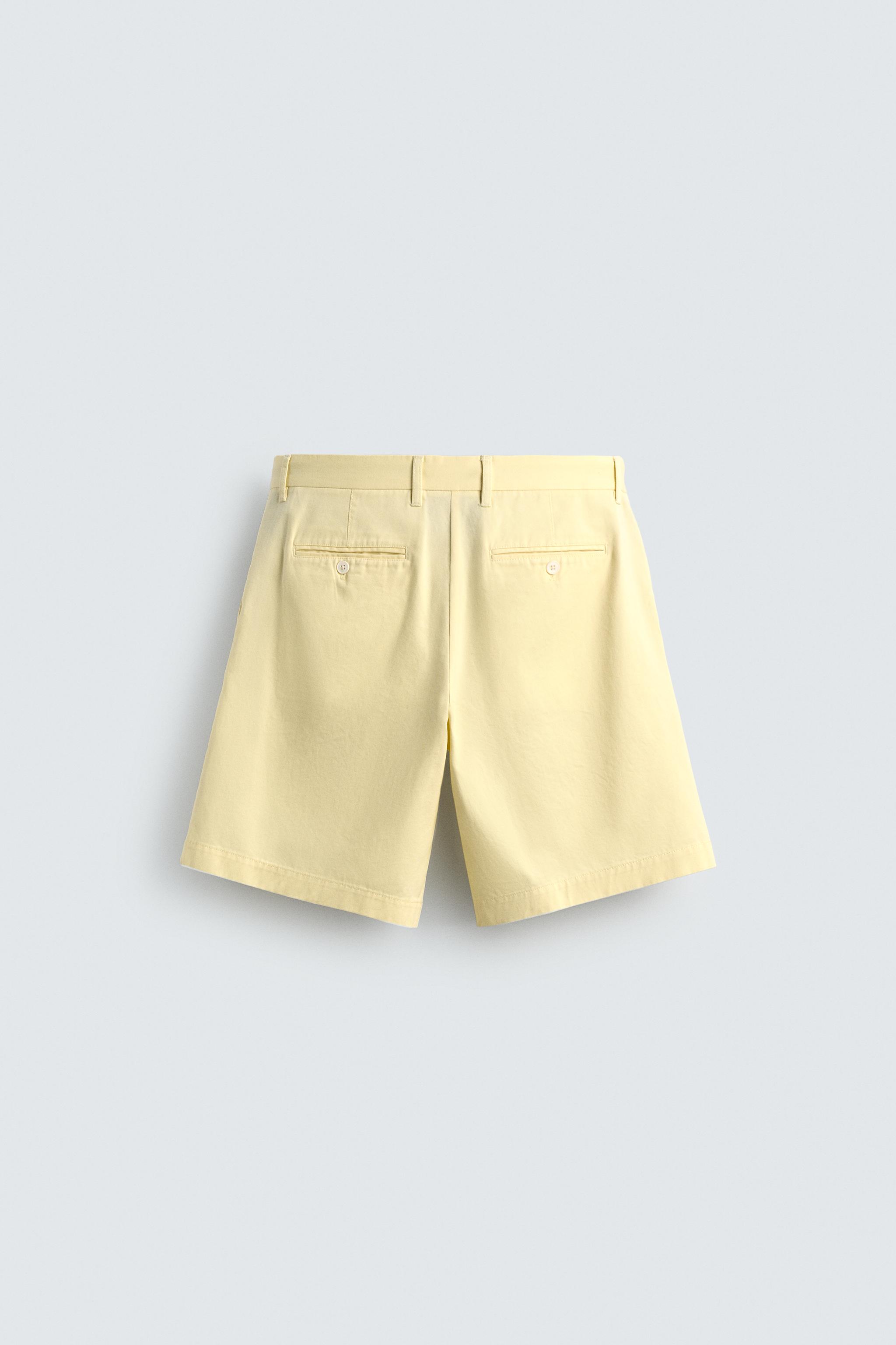 RELAXED FIT PLEATED SHORTS